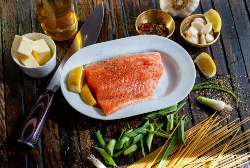 Photo credit: David B Townsend (unsplash.com). Salmon on a plate.